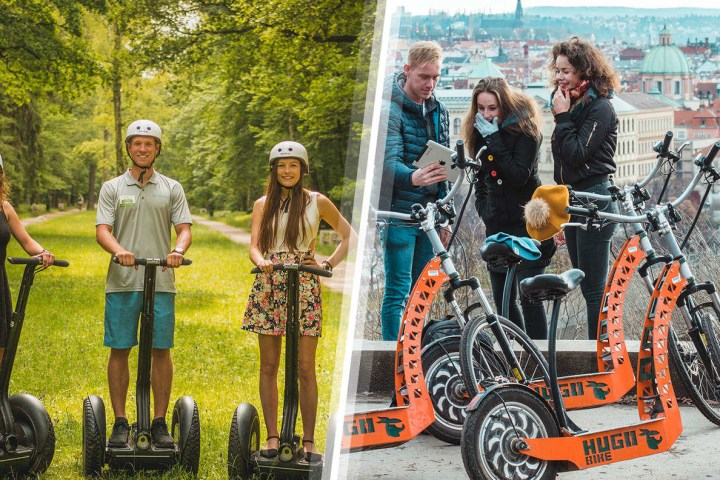 a group of people standing around a motorcycle