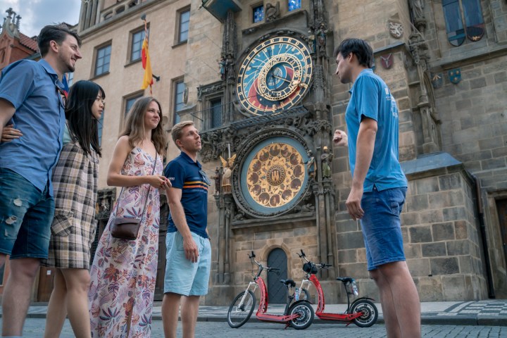 a group of people standing in front of a building