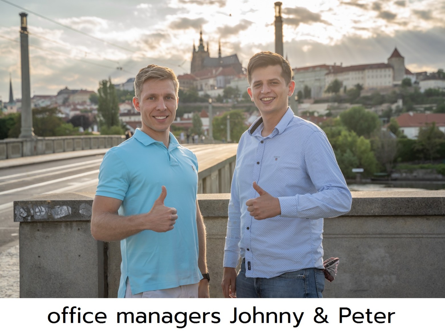 a man and a woman standing in front of a building