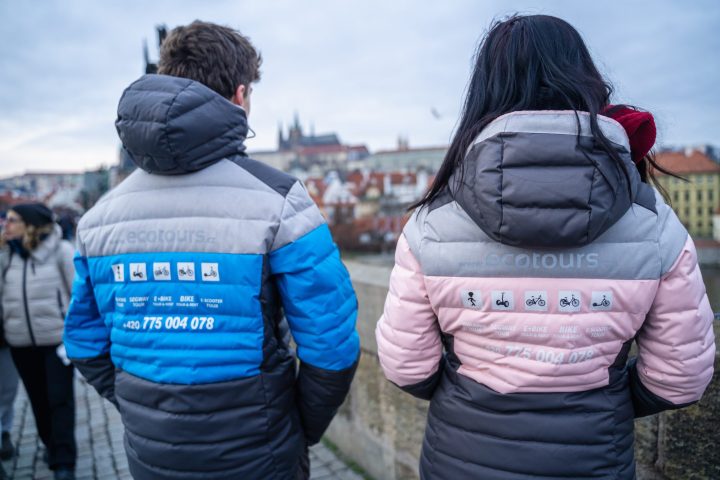 a group of people standing next to a person