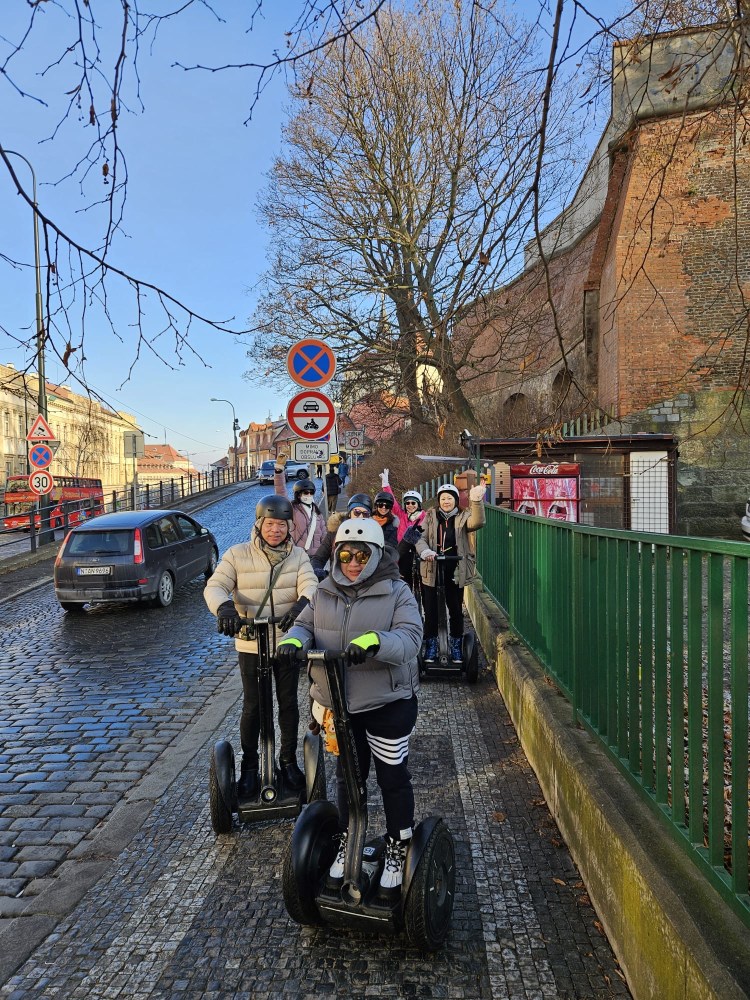 a group of people walking down the street